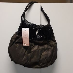 The reversible tote purse bag